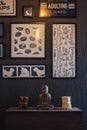Decorative Bronze Budha Trinket on Wall Shelf of a Cafe Shop