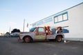 Decorative brown truck with `tow mater` on it