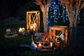 Night wedding ceremony with a lot of lights, candles, lanterns. Beautiful romantic shining decorations in twilight