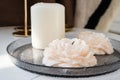 Decorative candle in the form of a flower on a glass stand Royalty Free Stock Photo