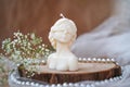 Decorative candle in form of woman bust. Soy candle handmade