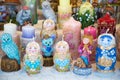 Decorative candles in the shape of a dog clown owl nesting doll. Royalty Free Stock Photo