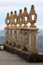 Decorative carved stone street lamps and hand railing fence