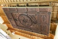 The decorative carved suspended ceiling - exhibit at the museum of the Sforzesco Castle - Castello Sforzesco in Milan, Italy