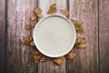 Decorative ceramic beige plate and yellow leaves