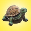 Decorative ceramic figurine of a turtle on a yellow background. 3d rendering Royalty Free Stock Photo