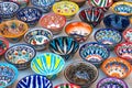 Decorative ceramic plates with traditional uzbek ornament in the street market of Bukhara. Uzbekistan