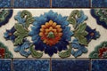 Decorative ceramic tile featuring colorful floral relief pattern Royalty Free Stock Photo
