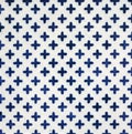 Decorative ceramic tile with plus pattern Royalty Free Stock Photo