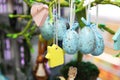 Christian Easter.Beautiful Wooden eggs weigh on a twig.