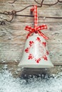Decorative Christmas bell on a rustic background Royalty Free Stock Photo