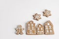Decorative Christmas food composition. Winter composition of star shaped gingerbread cookies with sugar icing isolated Royalty Free Stock Photo