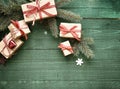 Decorative Christmas gifts tied with red ribbon Royalty Free Stock Photo