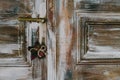 Decorative christmas star hanging on the old door handle Royalty Free Stock Photo