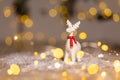 Decorative Christmas-themed figurines. Christmas deer. Christmas tree decoration. Festive decor, warm bokeh lights