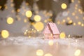 Decorative Christmas themed figurines. Little toy house, Christmas tale. Christmas tree decoration. Festive decor, warm bokeh Royalty Free Stock Photo