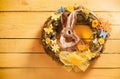 Decorative circular Easter wreath with rabbit