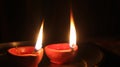 Decorative Clay diya or Oil Lamp lit during festival. Selective focus