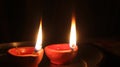 Decorative Clay diya or Oil Lamp lit during festival. Selective focus