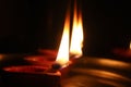 Decorative Clay diya or Oil Lamp lit during festival. Selective focus