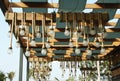 Decorative clusters of lamps against a blue sky.