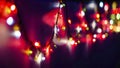 Decorative Colorful Blurred Christmas Lights On Dark Violet Background. Abstract Soft Lights. Colorful Bright Circles Of A Sparkli Royalty Free Stock Photo