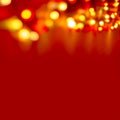 Decorative Colorful Blurred Christmas Lights On Red Background. Abstract Soft Lights. Colorful Bright Circles Of A Sparkling Garla Royalty Free Stock Photo