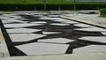 Decorative Concrete blocks over a man made lake. Decorative irregular concrete blocks arranged over a water body at a park