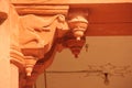 A decorative corbel supporting a ceiling