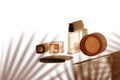 Decorative cosmetic on White Summer Background. Shadows and Sculptures. Copy Space Top view. Beauty Blogger Concept.