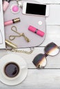 Decorative cosmetics, bag and phone. vertical Photo Royalty Free Stock Photo