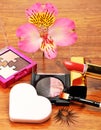 Decorative cosmetics and orchid flower