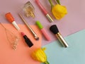 Decorative cosmetics, tulip flower fashion frame perfume on a colored background Royalty Free Stock Photo