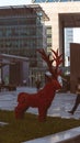 Decorative deer made of wood in the city