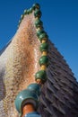 Decorative detail, in vertical, of the colored tiles on the roof of GaudÃÂ­`s Casa BatllÃÂ³, Barcelona