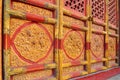 Decorative door carving with dragon motif in relief at the Hall of Supreme Harmony Taihedian Forbidden City, Beijing China