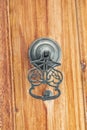 Decorative door knocker made on the wooden entrance door of the traditional Elmali mansions. Antalya-Turkey Royalty Free Stock Photo