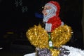 The decorative element is a Santa Claus e and a bottle of Heineken beer