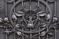 Decorative elements of metal forged gates, the appearance of a bull