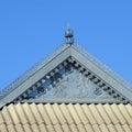 Decorative elements on ridge of roof