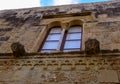 decorative elements and windows in the citadel of the fortress on the island of Gozo, Malta Royalty Free Stock Photo