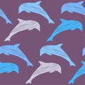 Decorative embroidered dolphins swim in the sea and ocean. Seamless pattern. Marine life. Cute cartoons. Royalty Free Stock Photo