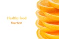 Decorative ending from a pile of slices of juicy orange on a white background. Fruit border, frame. Isolated. Food background. Cop Royalty Free Stock Photo