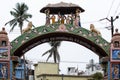 Decorative entrance to Sri Sri Totagopinath Temple with colorful sculptures