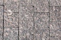 Decorative facing, made of a scabrous gray granite plates with a natural ornament. Royalty Free Stock Photo
