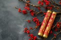 Decorative firecracker with background of ginkgo branch in chinese new year. Lunar New Year holidays