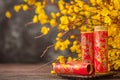 Decorative firecracker with background of ginkgo branch in chinese new year. Lunar New Year holidays