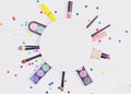 Decorative flat lay composition with makeup products, cosmetics and glass jars with decorative multi-colored stars. Flat Royalty Free Stock Photo