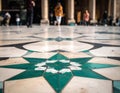 Decorative floor with star pattern in focus blurred people pass behind Royalty Free Stock Photo