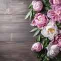 Decorative floral frame banner made of pink and white peony flowers. Old grey wooden table background. Created with Generative AI Royalty Free Stock Photo